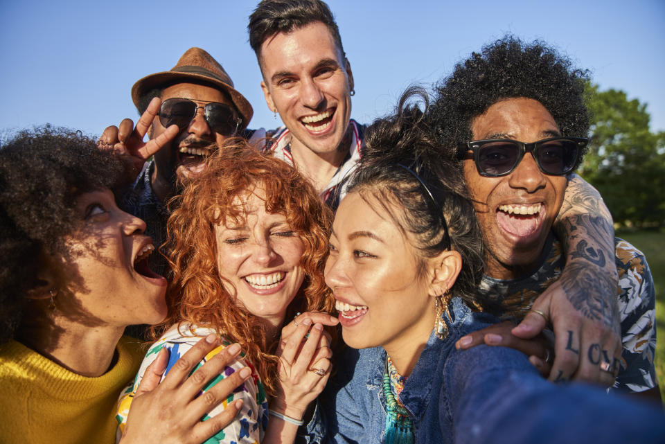 Group of friends feeling happy.  (Getty Images)